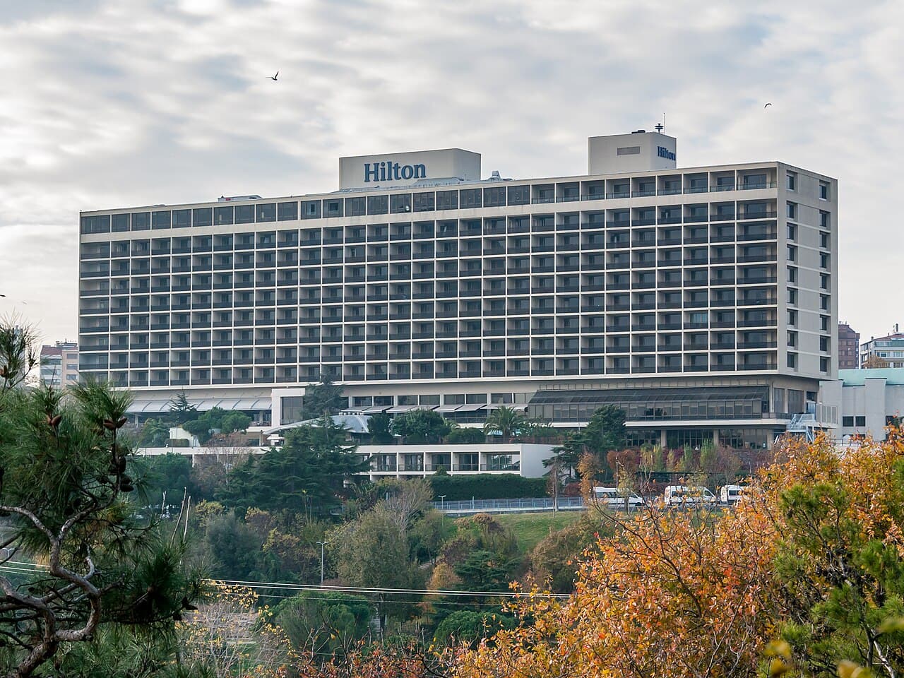 Hilton Istanbul Bosphorus hotel building above the Besiktas parkland