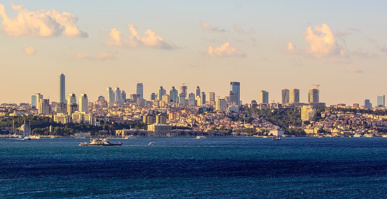 Towers of the Besiktas and Levent districts rising behind the Bosphorus shoreline